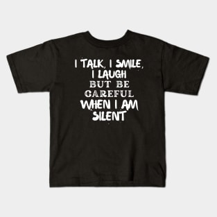 I talk, I smile, I laugh but be careful when I am silent Kids T-Shirt